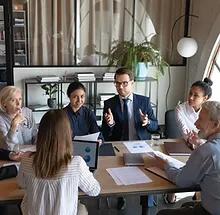 Business Meeting at Small Table